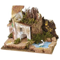 Grupo de casitas con estanque para belén de 15x10,5 cm.