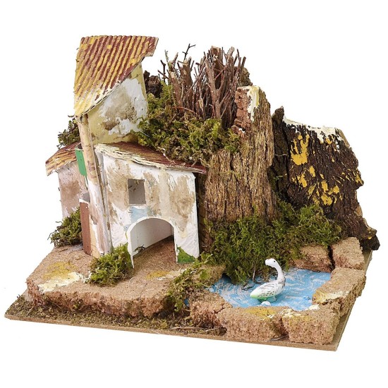 Grupo de casitas con estanque para belén de 15x10,5 cm.