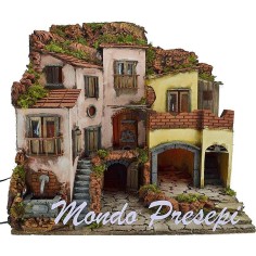 The crib with the village lit up with a fountain 60x40