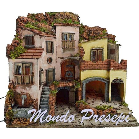 Nativity scene with illuminated village with fountain 60x40