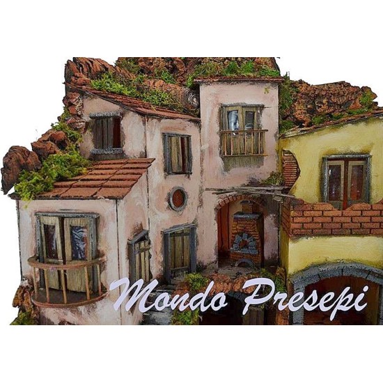 The crib with the village lit up with a fountain 60x40