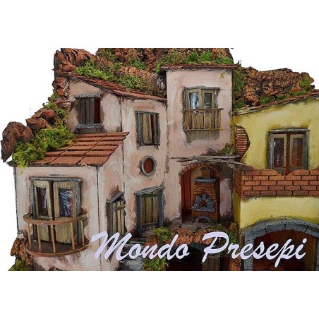 The crib with the village lit up with a fountain 60x40