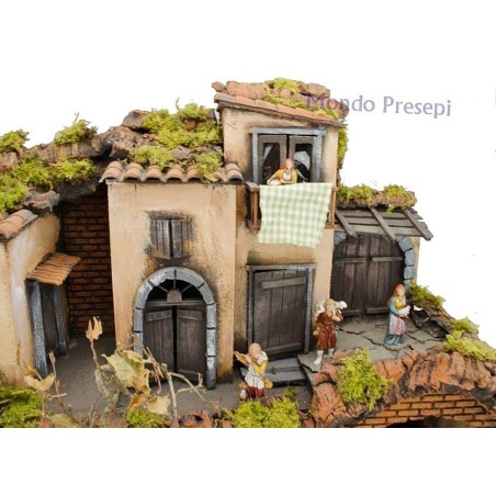 Presepe con statue illuminato con fontana 60x40 Mondo Presepi