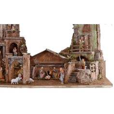 Full illuminated presepe of Landi statues with houses and 2