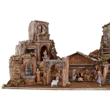 Belén iluminado completo con estatuas Landi con casas y fuente