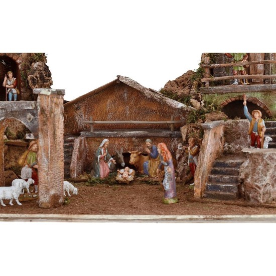 Full illuminated presepe of Landi statues with houses and