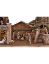 Full illuminated presepe of Landi statues with houses and