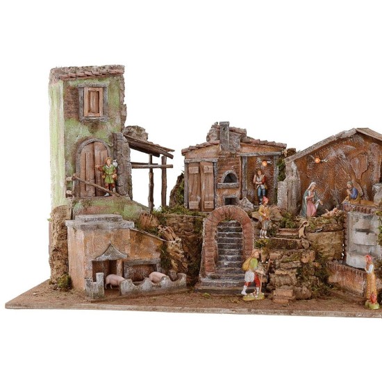 Illuminated nativity scene complete with Landi statues and landscape