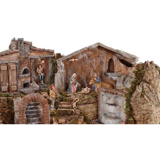 Full illuminated presepe of staue Landi with landscape and
