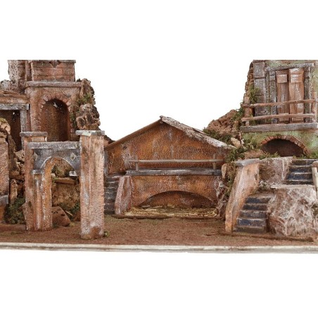 Belén iluminado con casas y fuente funcionando de 80x40x41 cm h.