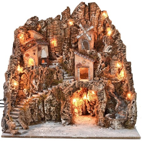 Illuminated nativity scene with windmill, waterfall, and oven