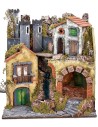 Illuminated Neapolitan nativity scene with moving drawbridge
