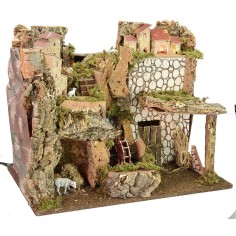 Scenografia per presepe illuminata con mulino ad acqua