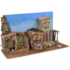 Belén completo con figuras Landi, cielo y fuente.