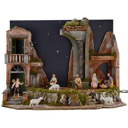 Complete nativity scene with Landi statues and illuminated starry sky