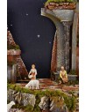 Belén completo con estatuas de Landi y cielo estrellado iluminado