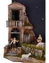 Belén completo de figuras Landi con cielo estrellado iluminado