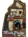 Belén con figuras Landi, fuego y luces de 40x29x44 cm de altura.