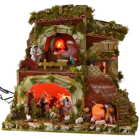 Presepe con statue in movimento cm 57x37x50 h