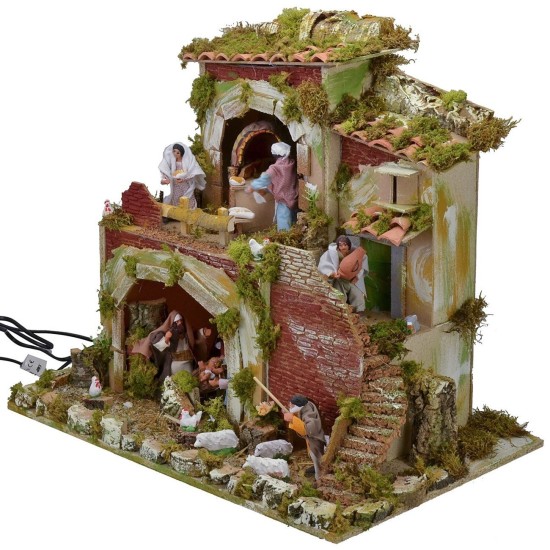Presepe con statue in movimento cm 57x37x50 h