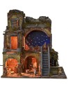 Illuminated nativity scene complete with Landi statues with starry sky
