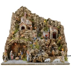 Belén iluminado completo con estatuas Landi y horno y cascada
