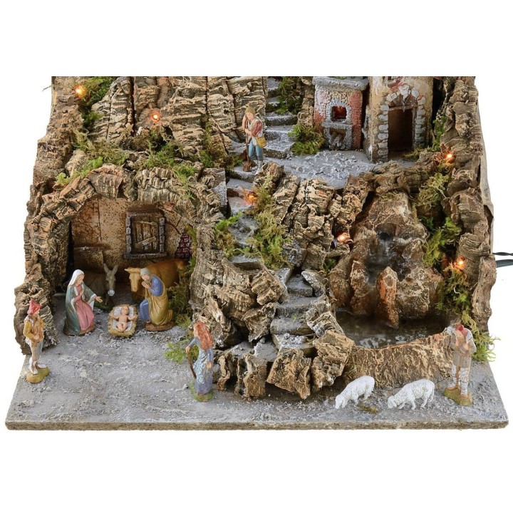 Illuminated nativity scene complete with Landi statues with oven and waterfall