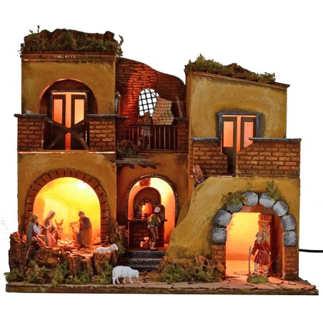 Pesebre iluminado completo con estatuas Landi con fuego