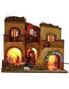 Pesebre iluminado completo con estatuas Landi con fuego