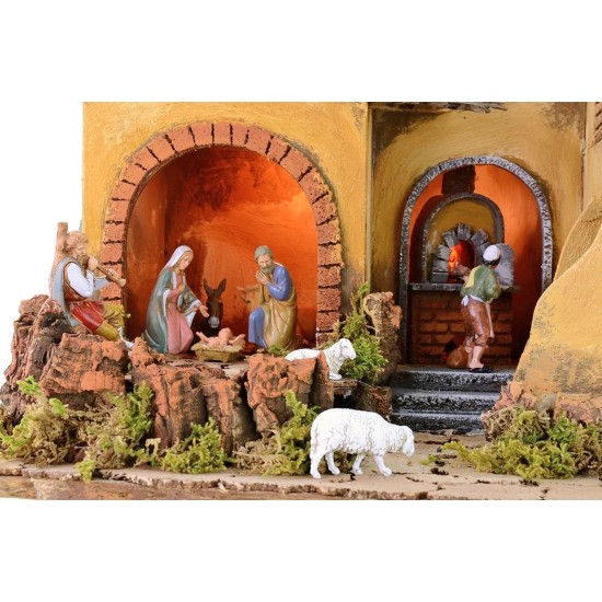 Pesebre iluminado completo con estatuas Landi con fuego