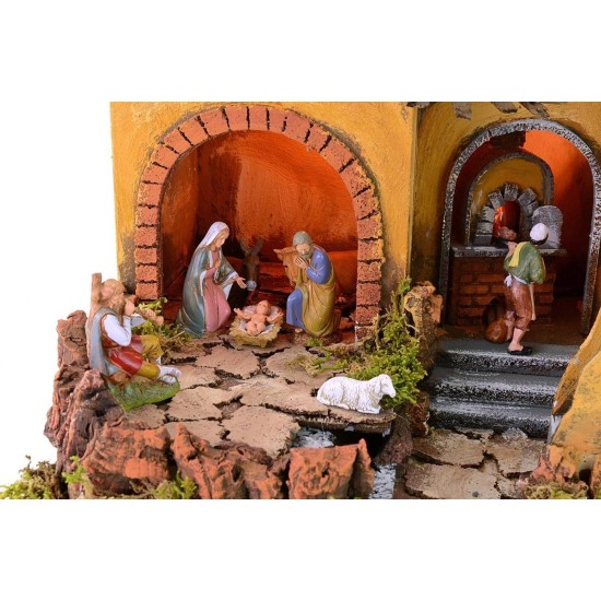 Pesebre iluminado completo con estatuas Landi con fuego