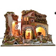 Illuminated nativity scene complete with Landi statues with 2