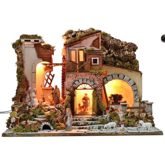 Illuminated nativity scene complete with Landi statues with