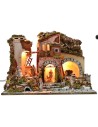 Illuminated nativity scene complete with Landi statues with mill