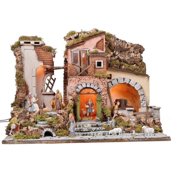 Illuminated nativity scene complete with Landi statues with mill