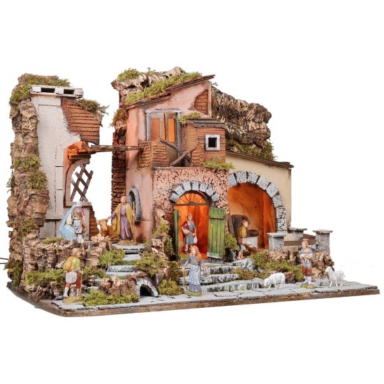 Illuminated nativity scene complete with Landi statues with mill