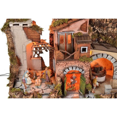 Illuminated nativity scene complete with Landi statues with