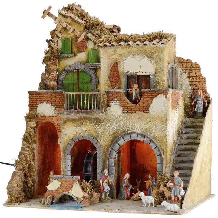 Illuminated nativity scene complete with Landi statues with water mill