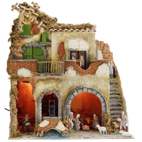 Illuminated nativity scene complete with Landi statues and water mill