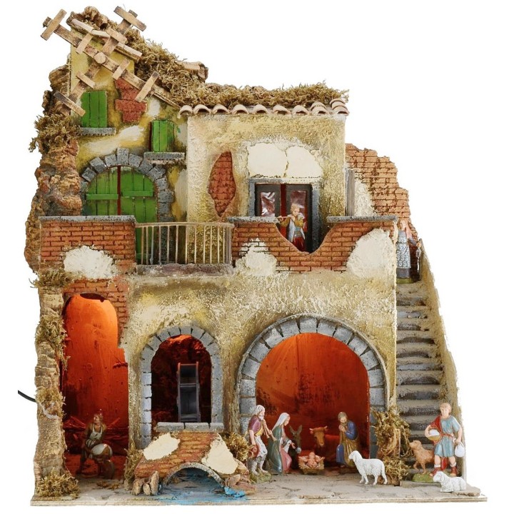Illuminated nativity scene complete with Landi statues with water mill