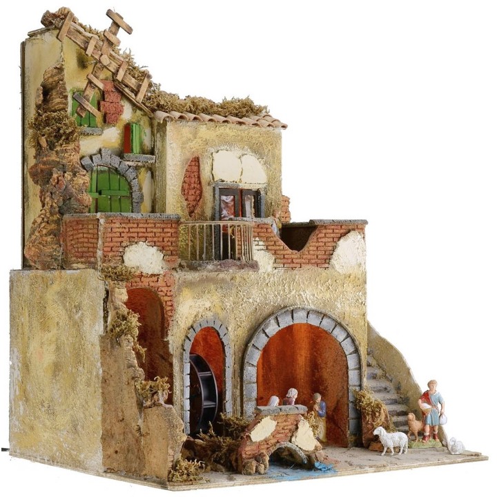 Illuminated nativity scene complete with Landi statues with water mill