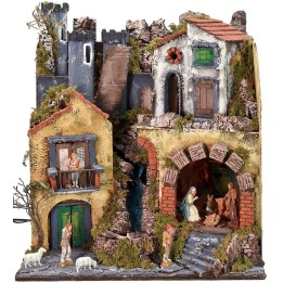Illuminated nativity scene complete with Landi statues with drawbridge