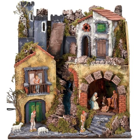 Illuminated nativity scene complete with Landi statues with drawbridge