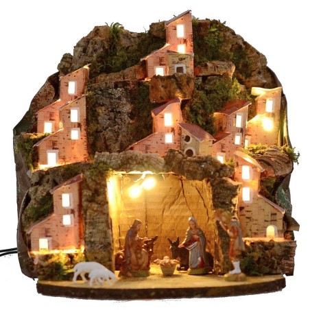 Belén iluminado completo con estatuas Landi con pueblo y