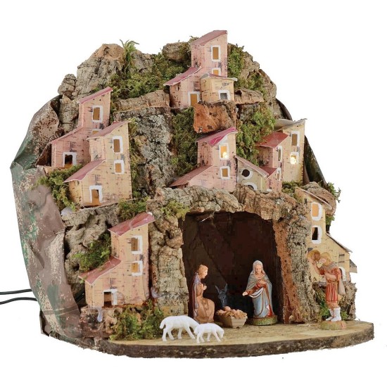 Illuminated nativity scene complete with Landi statues with village