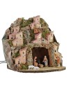 Illuminated nativity scene complete with Landi statues with village