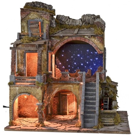 Illuminated nativity scene with fiber optic starry sky and