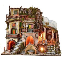 Illuminated nativity scene with fountain and working fire 2