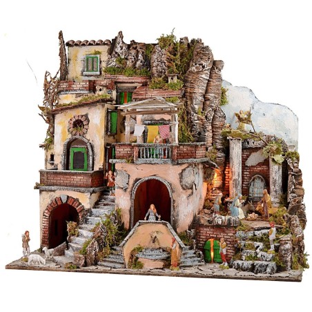 Presepe illuminato con fontana e fuoco funzionante completo di