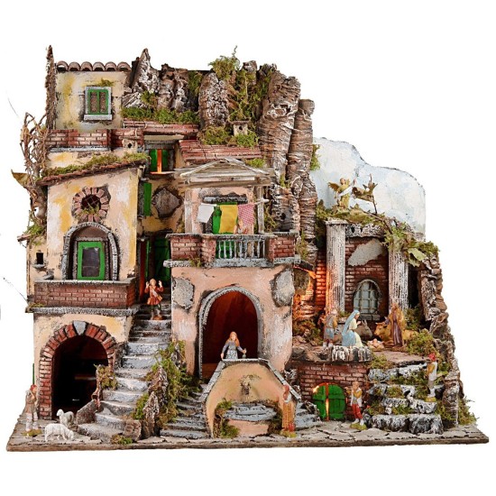 Illuminated nativity scene with fountain and working fire